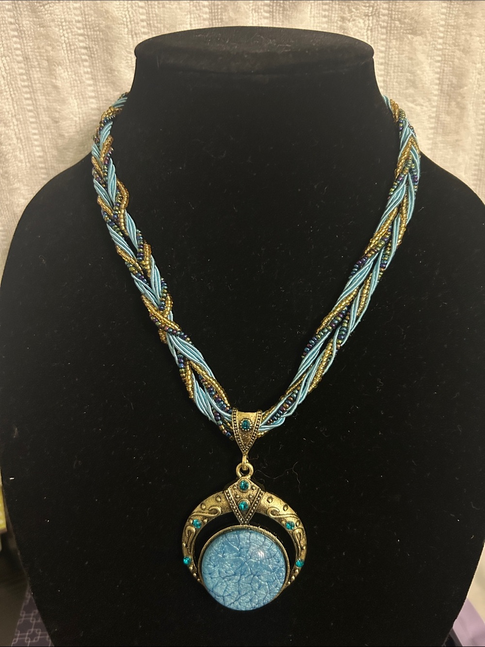 Blue Braided Bead Necklace with Ornate Gold Pendant